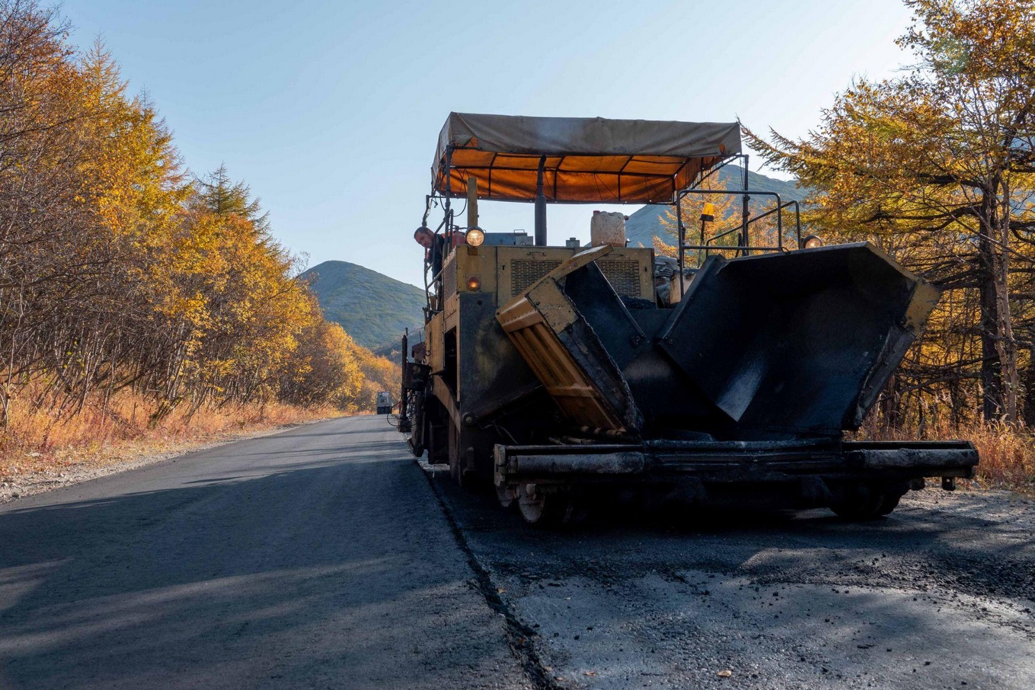 Asphalt paving contractor at work
