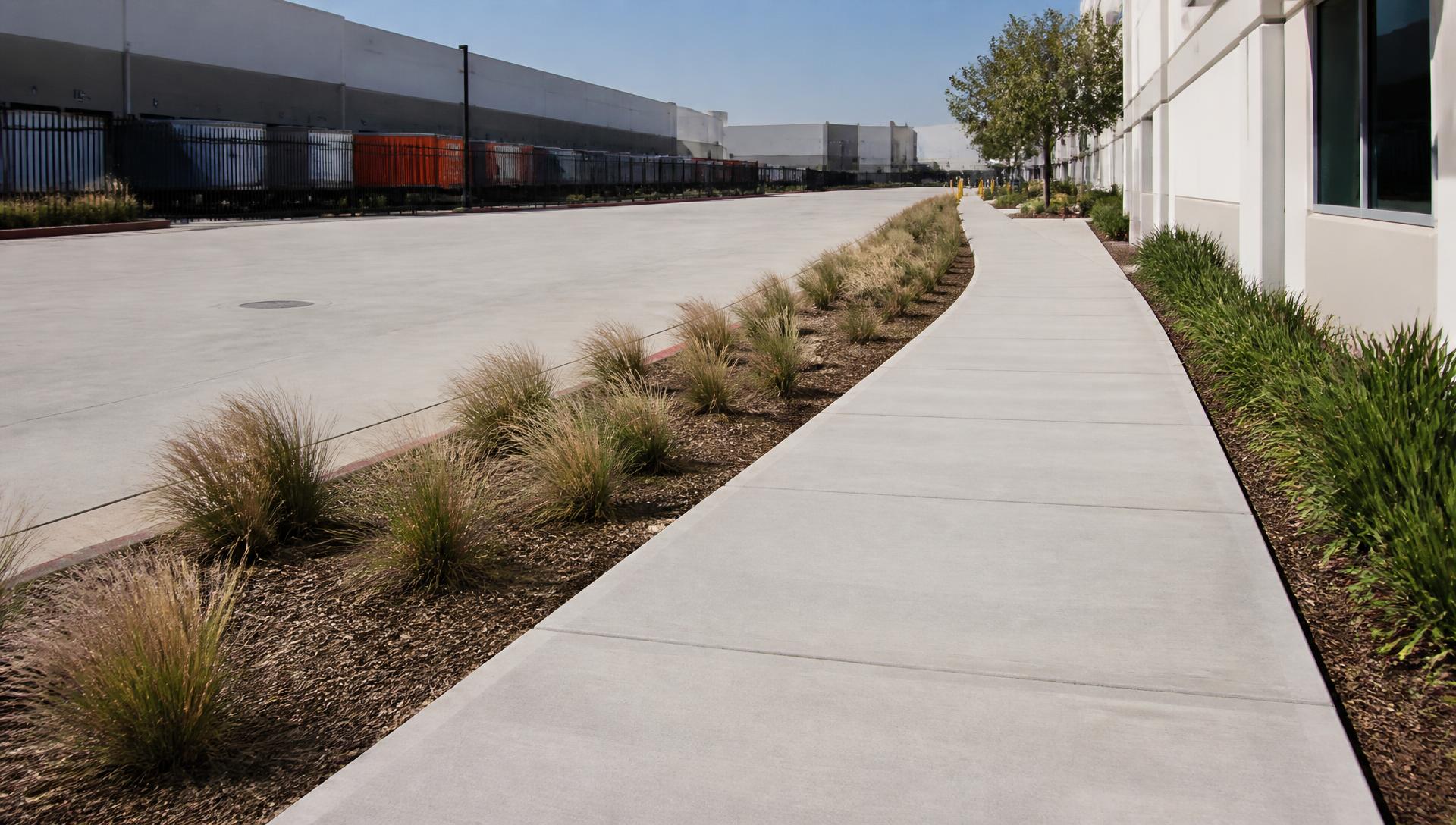 Finished commercial walkway demonstrating a well-planned industrial pavement in California